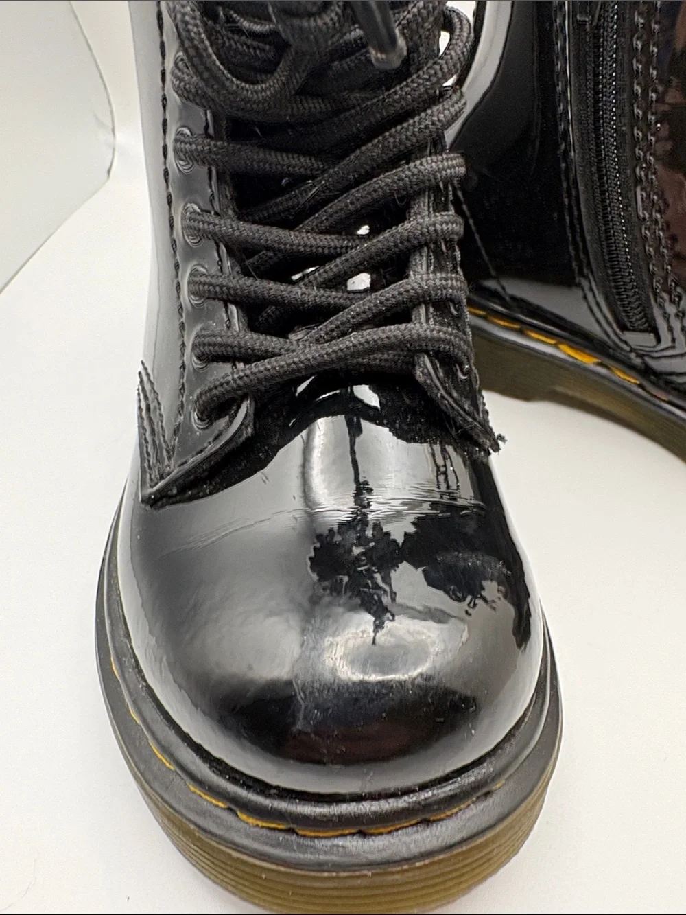 Dr. Martens Kids Glossy Black Patent Lace-Up Boots with Yellow Stitching